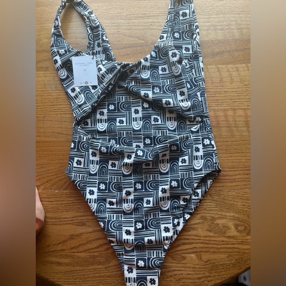 Skatie Chloe one piece in Kilauea with tags.